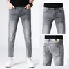 Calça jeans cropped masculina 2026 primavera/verão novo corte slim fit stretch versátil business casual calça 9 pontos