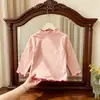 Nuevas camisetas para niños al por mayor, tops para niños de color liso con volantes, camisetas básicas, ropa de otoño de manga larga para niñas, prendas de una pieza para envío directo