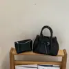 Bolso de mano tejido de estilo coreano de alta moda para mujer, otoño temprano 2026, bolso tote pequeño, bolso de hombro tipo cubo elegante y simple