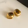 Brincos Olho de Tigre Estilo Melanoid Retro Senso de Design de Nicho Brincos Versáteis Luxo Leve Moda de Alta Qualidade Brincos de Tarraxa para Mulheres