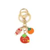 Llave de Metal Frutal Linda de Paz y Alegría Colgante Creativo de Carpa Colgante de Buena Suerte Colgante para Bolso Regalo