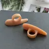 Almofada de dedo do pé com furo único almofada de correção de sobreposição de valgo separador de dedo em martelo deformação por flexão divisor de dedo fábrica de origem
