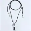 Collar con colgante de hoja de plata y carillón de viento de cuerda negra de diseño único de Liu Nian para mujer, cadena larga versátil de suéter de tulipán