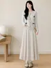 Falda de fideos de arroz blanca para mujer, nueva colección de otoño 2026, de cintura alta, falda fluida de línea A, talla petite, elegante falda midi de punto