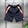 Pantalones cortos ajustados de verano para hombre, con rayas laterales y colores a juego, de corte delgado, deportivos, de playa, de media longitud