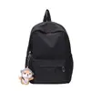 Venta al por mayor de fábrica mochila de nailon ultraligera bolsa de ocio versión coreana de bolsa de viaje de gran capacidad bolsa para estudiantes de secundaria moda