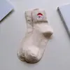 Calcetines navideños transfronterizos para mujer, calcetines de media pantorrilla para otoño e invierno, bordado de dibujos animados en colores caramelo, absorbentes de sudor, resistentes al olor, calcetines de algodón de color liso al por mayor