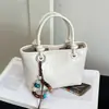 2026 Verano Nuevo Simple Moderno Retro Elegante Gran Capacidad Bolso de Cubo de Mano para Viajes Cotidianos Estilo Coreano Bolso Cruzado
