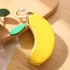 Bolso creativo de cuero PU con diseño de frutas en stock, accesorio popular en línea, colgante para llaves, monedero, bolsa para guardar auriculares