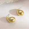 Pendientes de botón estilo metal minimalista transfronterizos europeos y americanos, pequeños y delicados, pendientes versátiles con un toque de lujo ligero y alta gama