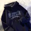 Moletom com capuz estampado de letras minimalista estilo americano para homens, novo modelo outono e inverno 2026, blusa hoodie casual solta oversized