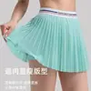 Falda corta deportiva para mujer transfronteriza, falda pantalón plisada, anti-exposición, para correr, fitness, tenis, bádminton, estilo fino de verano