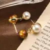 Pendientes Retro Maillard Asimétricos de Ojo de Tigre y Perla Pendientes Simples Elegantes Versátiles Lujo Accesible Pendientes de Gama Alta