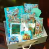 Caja de regalo con diario temática de ciudad, juego con páginas ilustradas, cuaderno, bloc de notas para estudiante, bolígrafo de firma Modilan y juego de marcapáginas