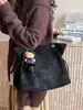 Bolso de cubo retro de gran capacidad para mujer, nueva colección otoño/invierno 2026, bolso de hombro con cadena a la moda, bolso cruzado de nicho para el día a día