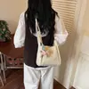 Bolsa de mão versátil estilo coreano, nicho, retrô, para mulheres, novo modelo outono 2026, bolsa de ombro tipo balde texturizada de alta qualidade