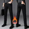 Jeans pretos de alta qualidade para primavera/verão de Hong Kong para homens, novos calças compridas casuais versáteis de corte reto slim fit elásticas para homens