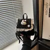 Mochila pequeña escolar casual exquisita para mujer 2026, nueva, fresca, con adorno de encaje de estrellas, dulce y femenina