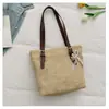 Bolsa da Moda Feminina 2026 Nova Bolsa de Grande Capacidade Verão de Mão Personalidade Casual Simples Tecida em Palha Bolsa Tote Estilosa