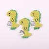 Parche de ropa de bordado a máquina de estilo europeo de gran venta al por mayor DIY color algodón caricatura dinosaurio bordado pegatinas de tela
