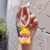 Llavero colgante de gato deportivo de moda de dibujos animados, lindo regalo para pareja, llavero de coche, colgante de gato