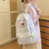 Mochila azul marino de color claro contrastante con textura tejida para estudiantes, estilo universitario americano, adecuada para uso diario casual, viajes y escuela