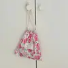 STEENAIO Bolsa de Almacenamiento para Artículos Varios con Cordón Floral Bolsa para Cambio de Bolsillo para Caminar Bolsa Pequeña de Tela para Llevar en la Mano Bolsa para Teléfono Móvil (Bienestar