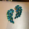 Pendientes colgantes de rombos con borlas tachonados de diamantes de aguja de plata transfronterizos europeos y americanos, pendientes exquisitos y de moda, pendientes versátiles y elegantes al por mayor