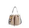 Yuezizhi 2026 outono inicial nova bolsa versátil casual com cordão, bolsa saco, bolsa de ombro e transversal elegante e única