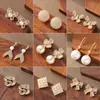 Pendientes de Botón de Plata Moda Estilo Festivo Exquisito Incrustados con Circonita Perla Trébol de Cuatro Hojas Mariposa Cola de Pez con un Toque de Lujo