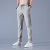 2026 Novas Calças Casuais Masculinas Slim Fit, Calças Longas Finas, Estilo Tendência Primavera e Outono, Calças Longas Masculinas Versáteis de Cor Sólida