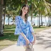 Traje de baño para pareja al por mayor Coreano Vacaciones Playa Conservador Falda de una pieza Estilo Traje de baño para mujer Pantalones de playa para hombre Traje de pareja