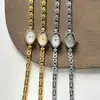 Relógio Pulseira Dourado com Mostrador Estiloso e Requintado, um Relógio de Quartzo à Prova d'Água e Versátil de Alta Aparência para Mulheres
