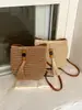 Bolsa de Paja Estilo Nuevo para Vacaciones en la Playa junto al Mar Transfronteriza 2026 Bolso Cubo para Mujer Bolso de Hombro Cruzado Versátil de Moda