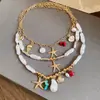Collar de Concha Estrella de Mar con Goteo de Aceite de Perla, Exquisita Cadena para Clavícula Versátil de Estilo Festivo, Joyería de Nicho de Lujo Ligero de Alta Gama para Mujeres