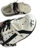 Estilo coreano diseño lechoso suave sentido del diseño patrón de estrellas blanco y negro versátiles zapatillas de plataforma para mujer 2026 otoño nuevo elegantes zapatillas de pan