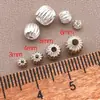 Chapado en cobre oro de 18 quilates cuentas redondas de calabaza con rayas verticales huecas cuentas espaciadoras de sandía pulsera DIY accesorios de joyería al por mayor