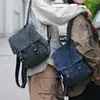 Mochila Jeans Primavera 2026 Lavada Retro Grande Capacidade Bolsa de Lona Nova Moda Unissex Bolsa de Viagem