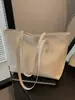 Bolso Tote Nuevo de Moda Texturizado y Sencillo para Mujer Gran Capacidad Casual Nicho para Viajes Diarios Bolso de Hombro Personalizado