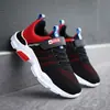 Fábrica de Jinjiang Zapatos Nuevos para Niños Zapatos Deportivos de Primavera para Niños Niños Niñas Flyknit Transpirables Zapatos Casuales Zapatos para Correr para Niños Grandes y Medianos