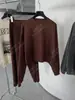 Yuran 26 Estilo Nuevo de Principios de Primavera Moda Lino Algodón Liso Silueta Micro-Capullo Jacquard Denso Top de Punto Casual