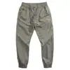 Pantalones de pierna casuales delgados de verano para hombre de secado rápido, pantalones deportivos de estilo coreano modernos sueltos de secado rápido con cordones
