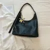 Bolsa de mano de gran capacidad de color liso, nueva bolsa de hombro retro de moda para el verano 2026, bolsa de axila de moda para el trabajo y los desplazamientos