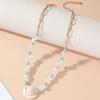 Collar de conchas de estilo transfronterizo para mujer, cadena de clavícula con perla de piedra volcánica, diseño de nicho con sentido de combinación.