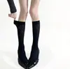 Calcetines de jacquard con patrón de rombos, versátiles y adelgazantes hasta la pantorrilla, con un toque vintage de alta gama, calcetines simples hasta la rodilla con forma de rombo