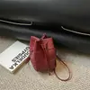 Shuai Mijia 2026 Nova Bolsa Saco com Cordão Simples Casual para o Dia a Dia Bolsa de Ombro Único Moda Retrô Cor Sólida Bolsa Transversal
