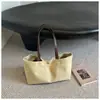 Bolsa de ombro casual simples para atacado para mulheres, nova moda bolsa de lona simples para o dia a dia, bolsa de axila de grande capacidade