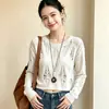 Top corto de punto desgastado y hueco para mujer, nueva colección de otoño, diseño de nicho y sexy con adorno de collar, top de manga larga con estampado de diamantes