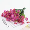 Hierba de agua de simulación, hierba de primavera de plástico, flor violeta, serigrafía, cinco margaritas de hierba de primavera, flores falsas, accesorios decorativos al por mayor