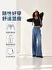 Pantalones vaqueros de punto de pierna ancha de tiro alto, estilo retro, para mujer, con un diseño fluido y plisado, y un corte holgado hasta el suelo.